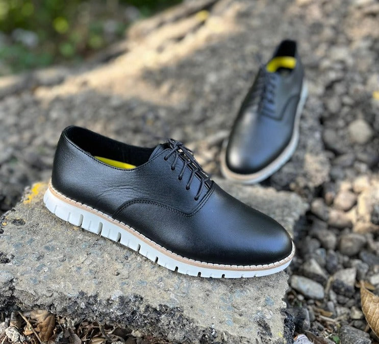 BLACK AND WHITE LEATHER SHOES